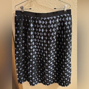Black pleated skirt with blue pattern
